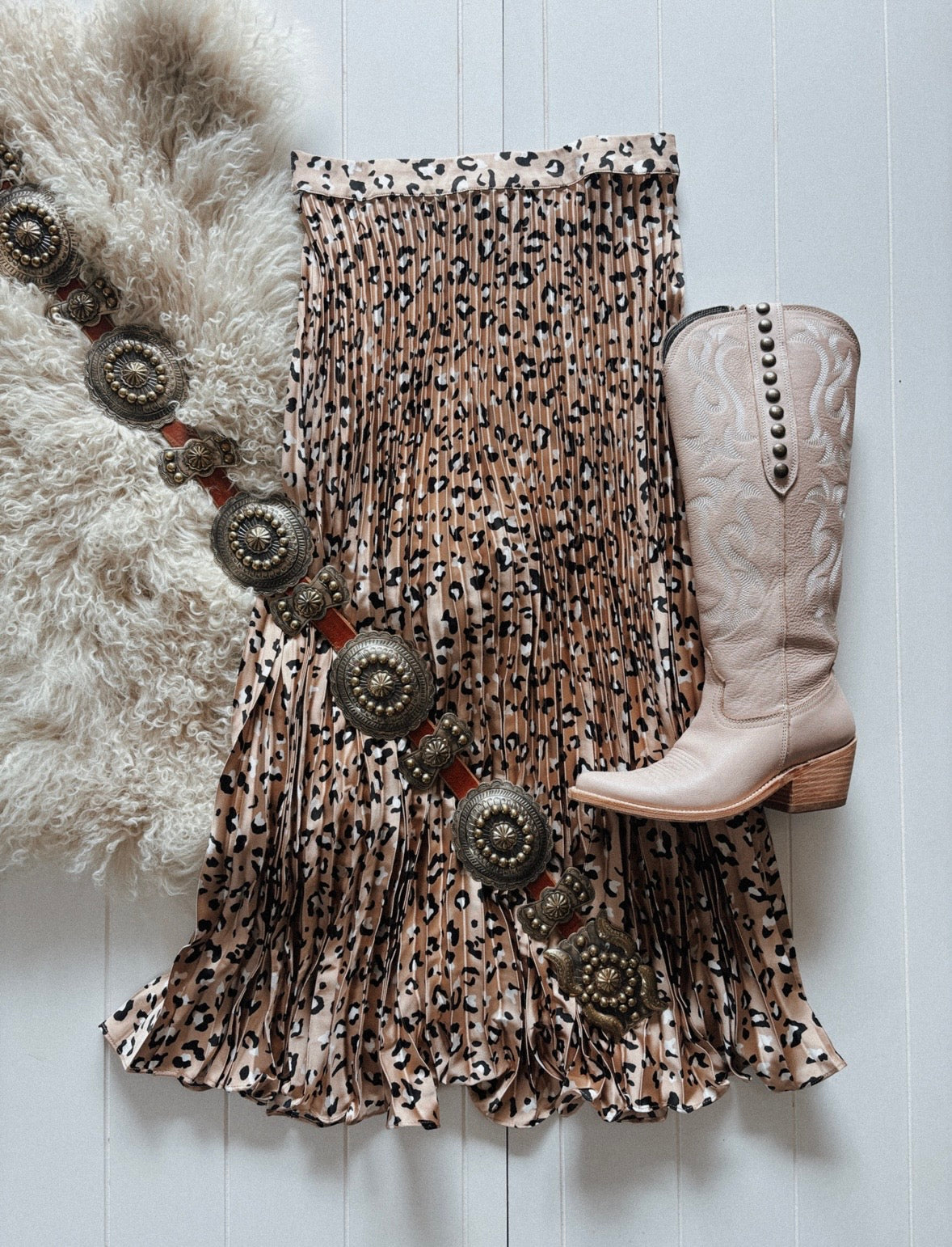 A pleated leopard-print silky maxi skirt