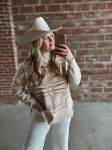 Mock neck cross sweater with slight bubble sleeve in creams, pink, taupes. Soft and cozy 