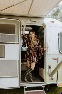 Black Floral romper with boho sleeves and ruffle